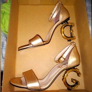 Dolce and Gabbana heels size 8 beige and gold in color